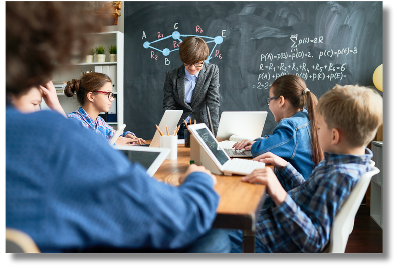 A photo of children engaged in learning in a classroom, symbolizing a type of organization AIYSpace nonprofit serves. This image represents education and community, promoting STEM education and empowering young minds to explore.